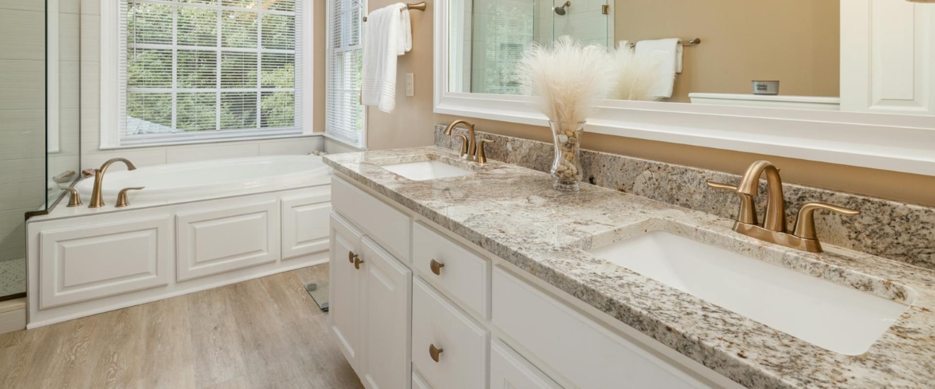 Step Into Luxury: Transforming Your Humble, TX Bathroom With Hardwood Flooring